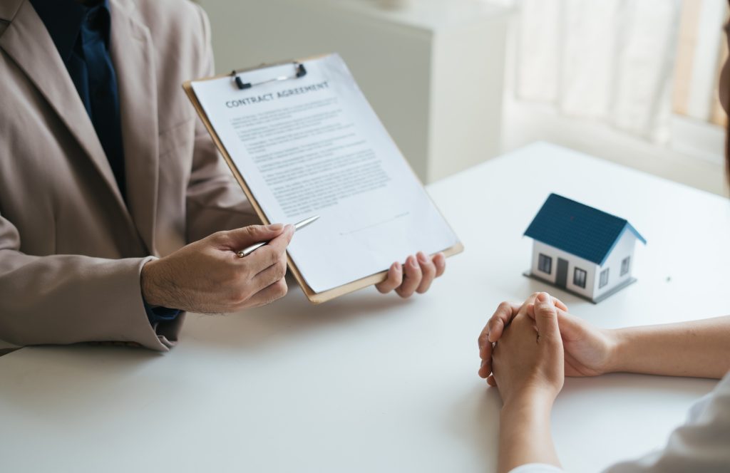 Real estate agent and realtor general liability insurance businessman professional discussing and